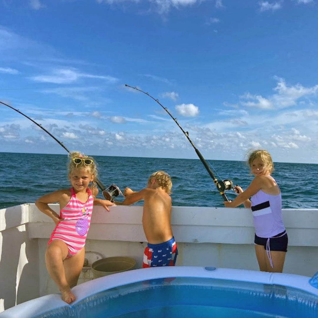 children fishing offshore out of Fort Morgan, Alabama