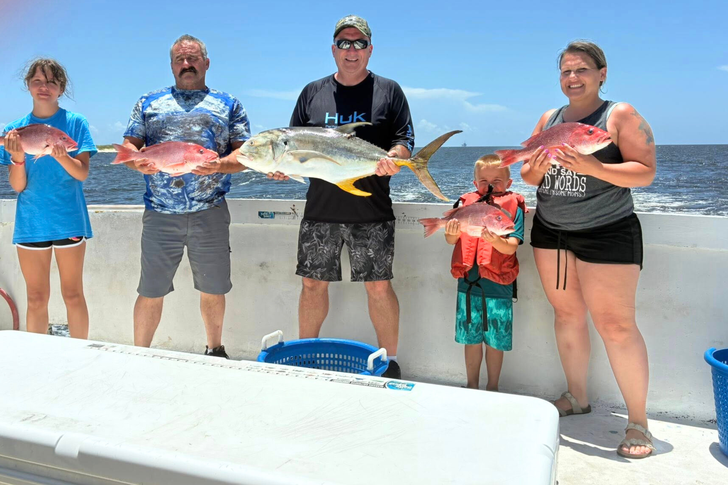 family fishing trip aboard the no doubt- charter fishing boat accommodating large groups out of fort morgan, alabama