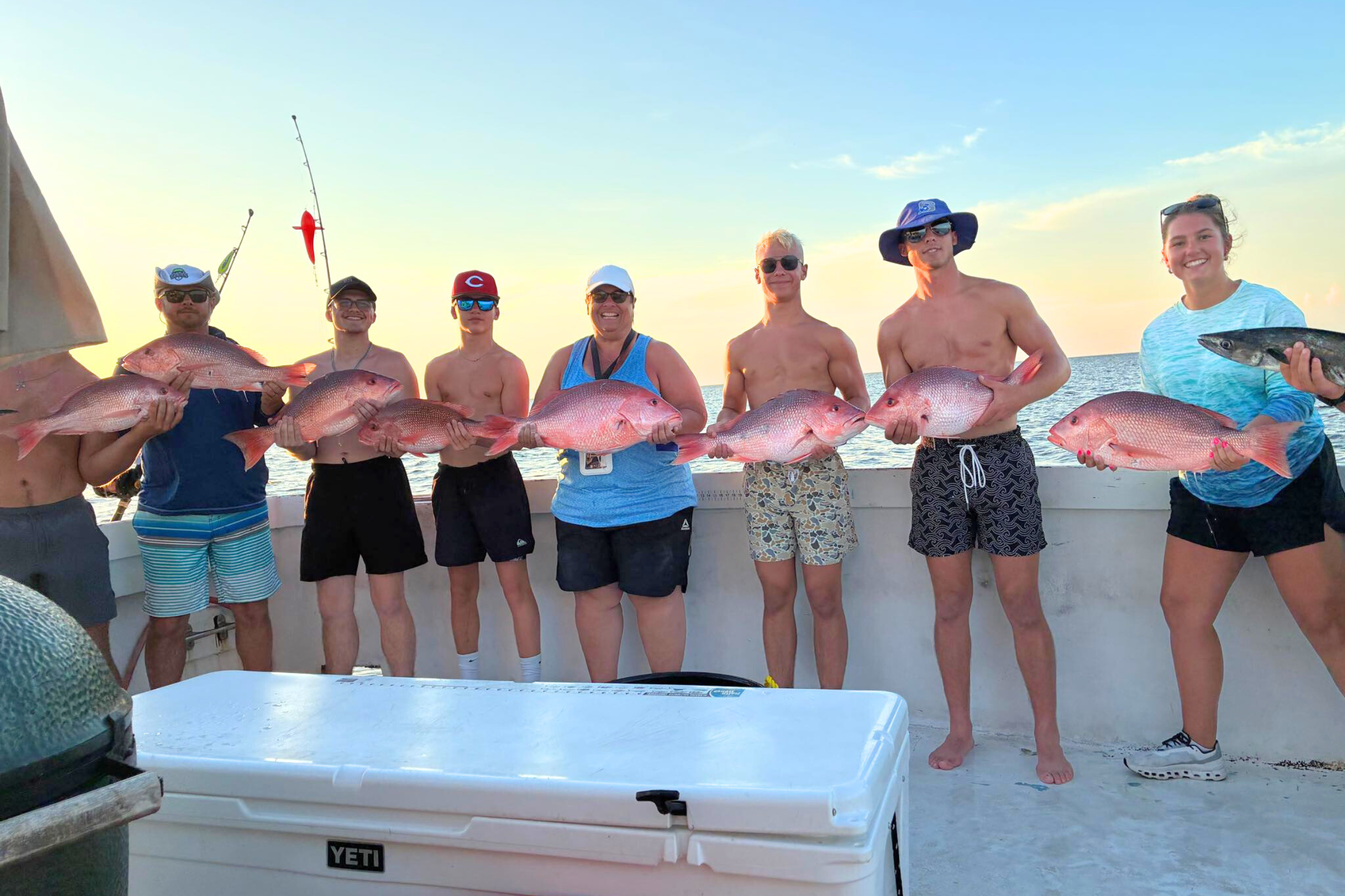 large family group fishing aboard the no doubt, private offshore charter trips out of fort morgan, alabama