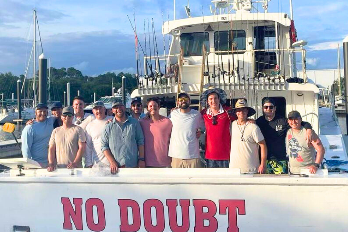 large group of guys heading out on an offshore fishing trip out of Orange Beach, Alabama