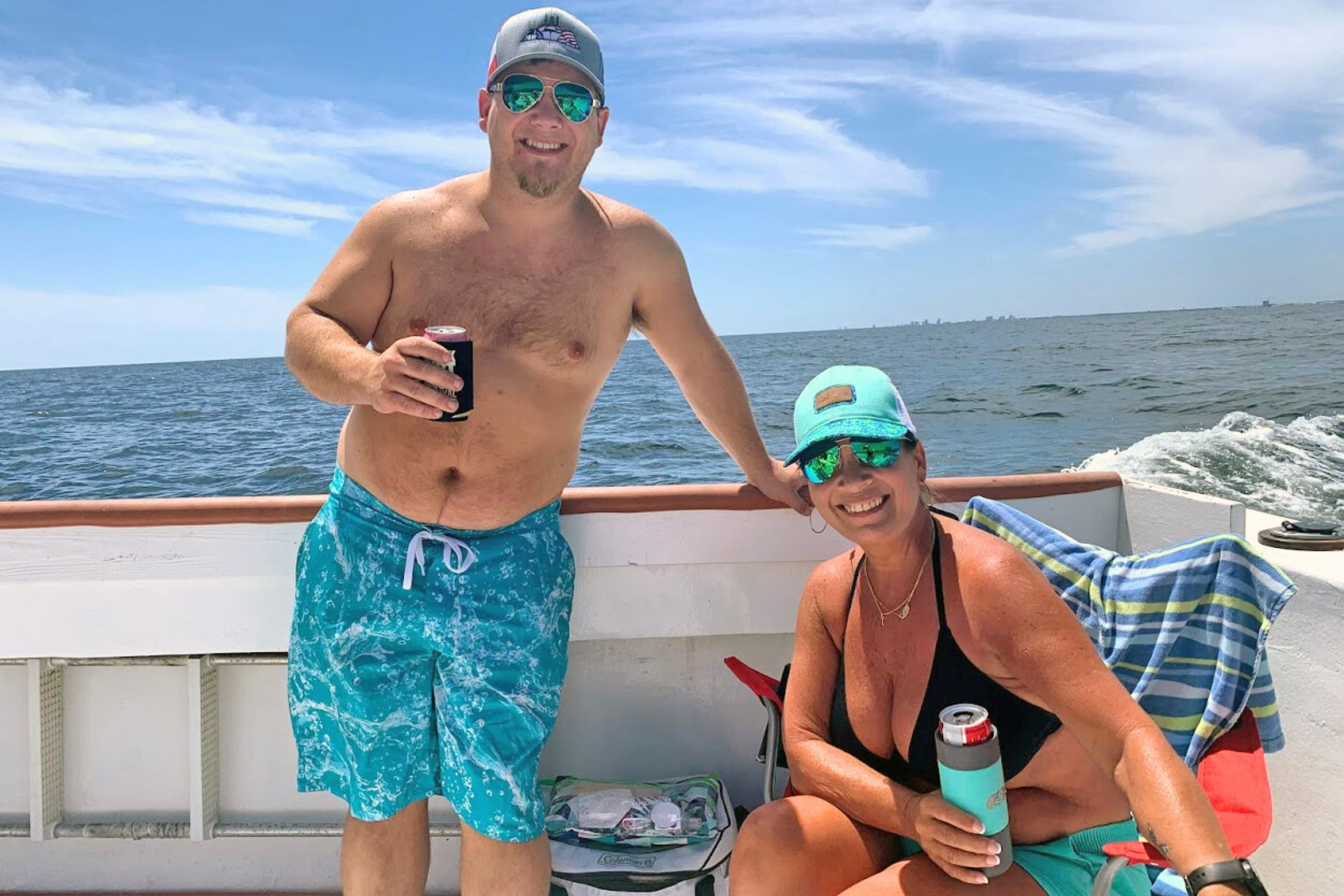 mom and son enjoying a fun ride back to fort morgan marina on charter fishing boat