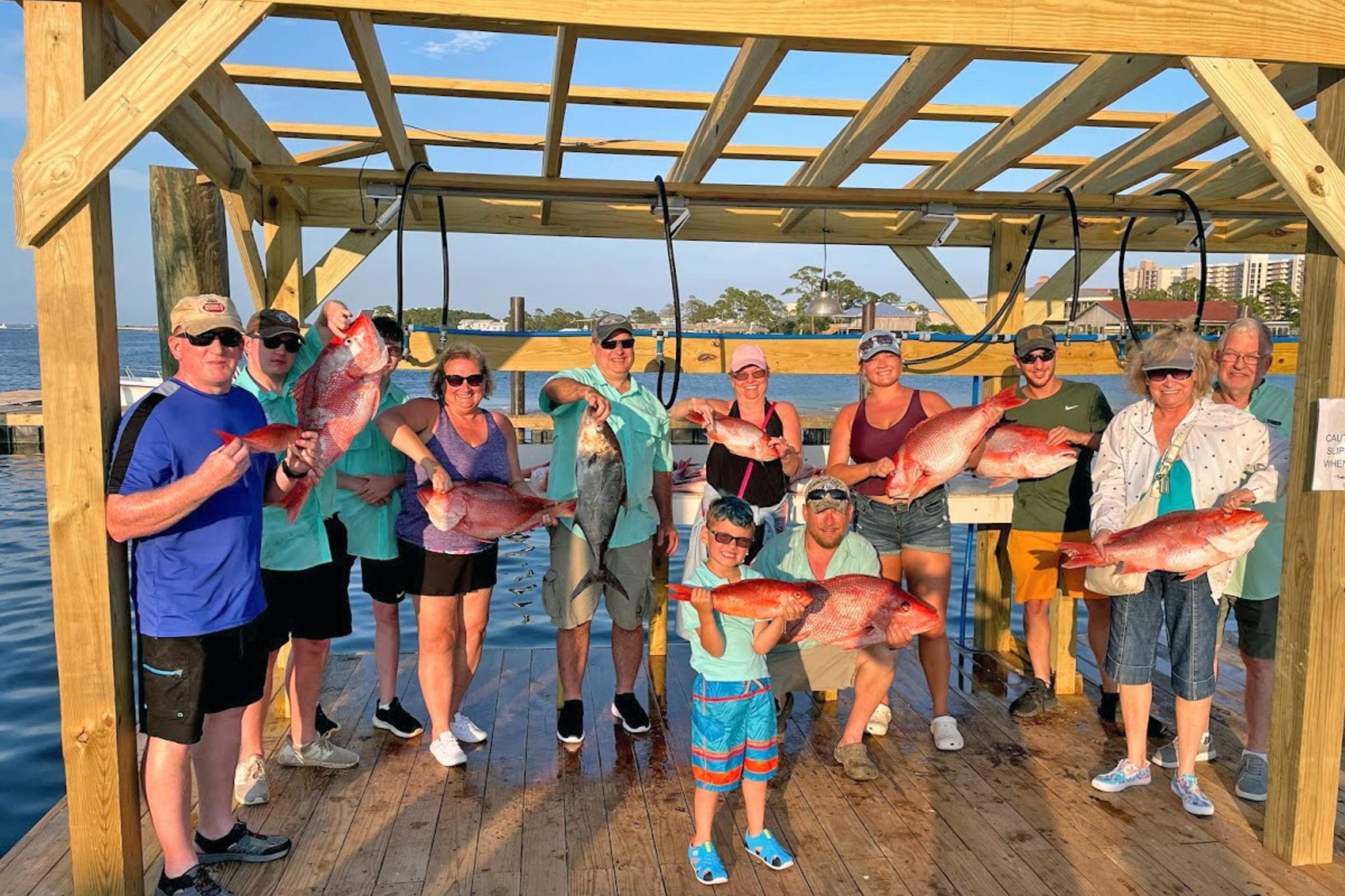 large family group returning home to fort morgan marina after successful day of offshore fishing aboard the No Doubt
