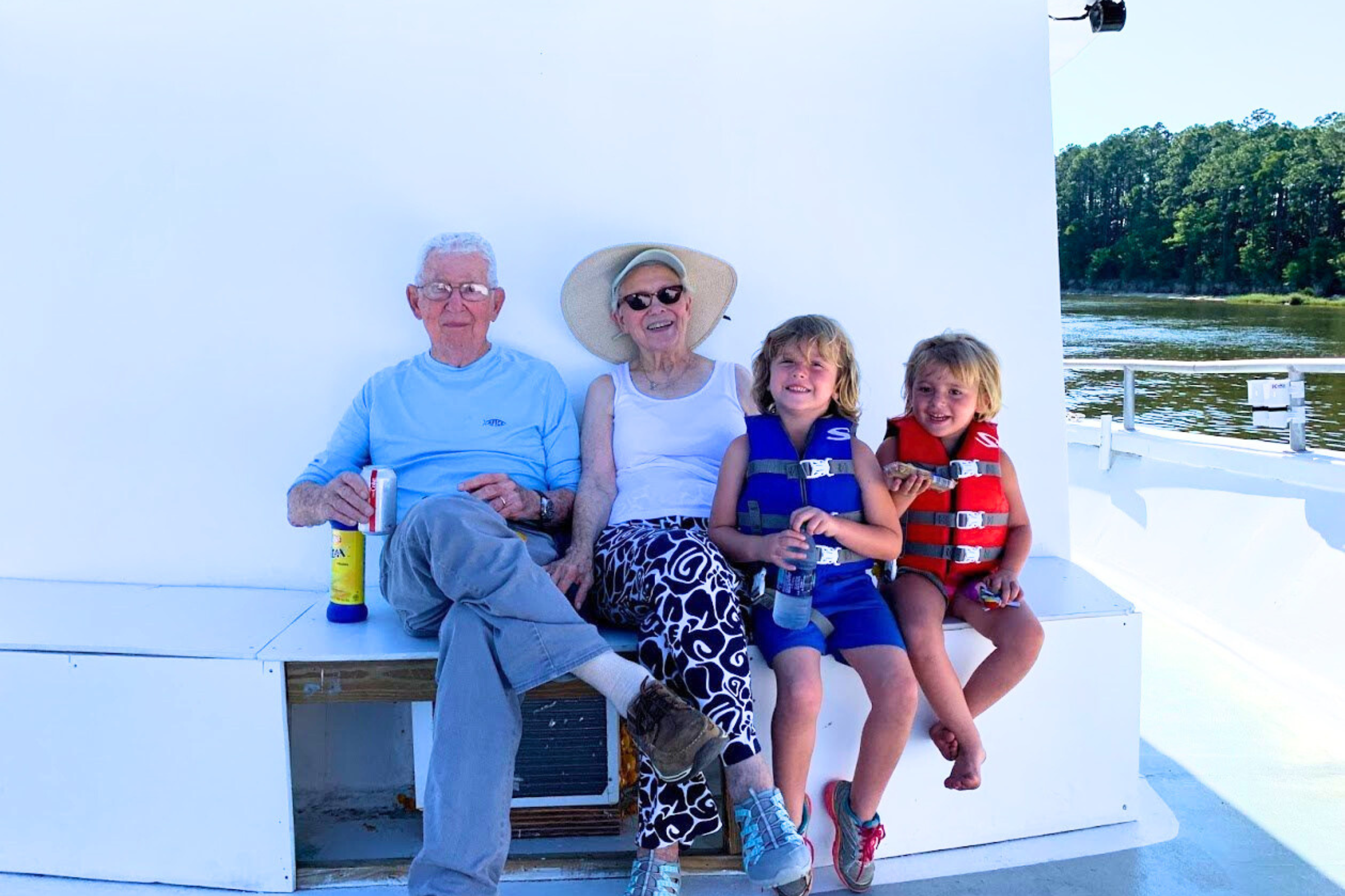 kids and grandparents sharing memories on offshore charter boat fishing cruise