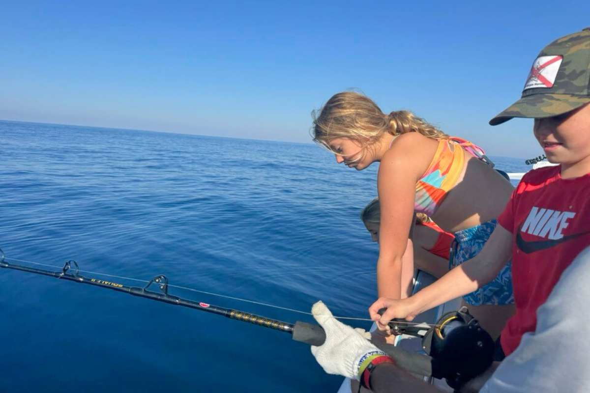 kids red snapper fishing on offshore charter fishing boat out of fort morgan marina