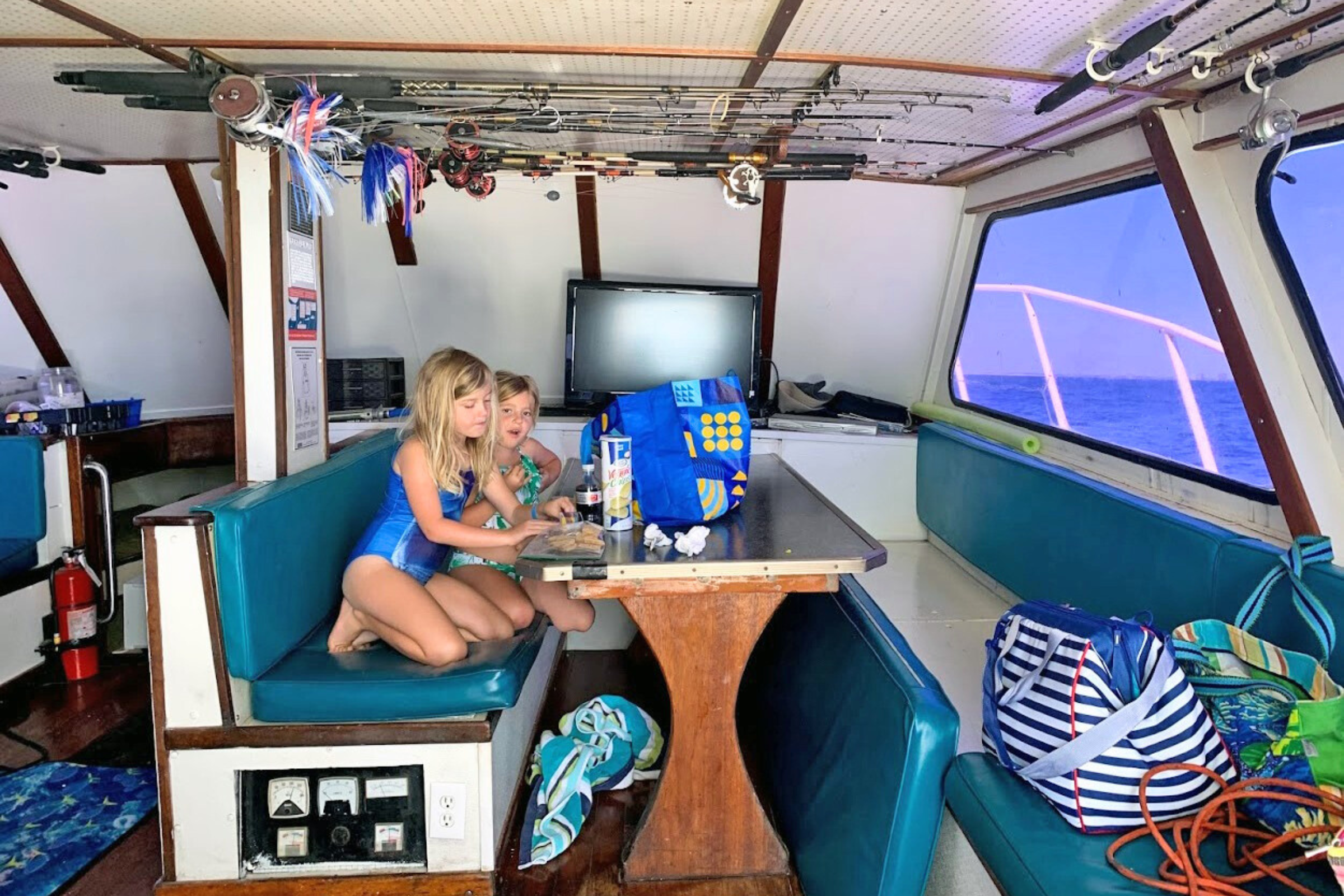 photograph of the interior cabin of the no doubt, air-conditioned offshore charter fishing boat