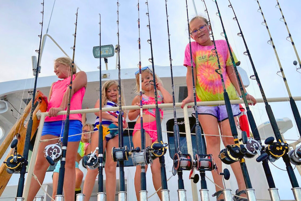fun group of girls hanging out on an offshore / trolling fishing trip out of Orange Beach, Alabama