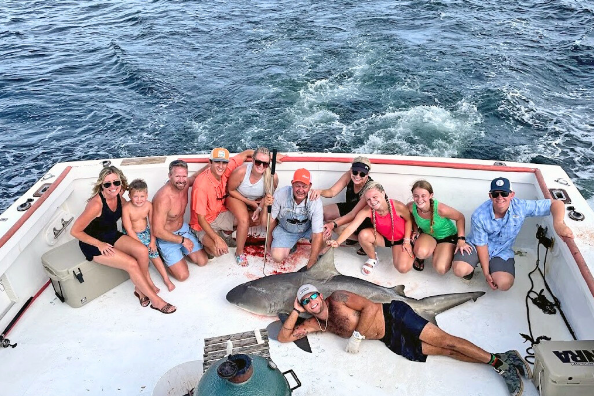 large group on shark fishing trip aboard the No Doubt