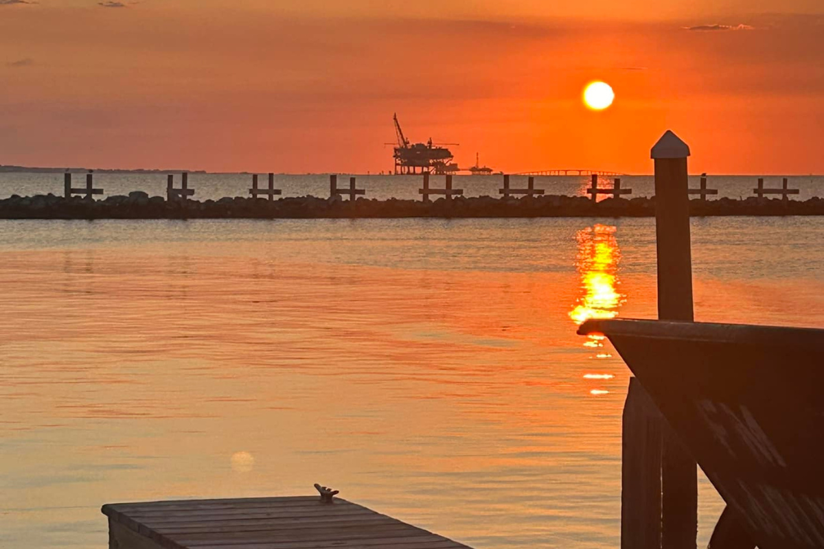 sunset at Fort Morgan marina
