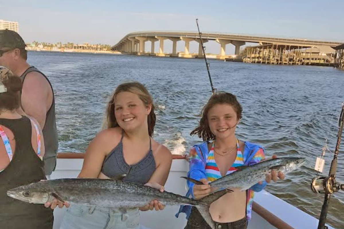 girls showing off their catch on a 4 hour trolling trip out of Orange Beach, Alabama