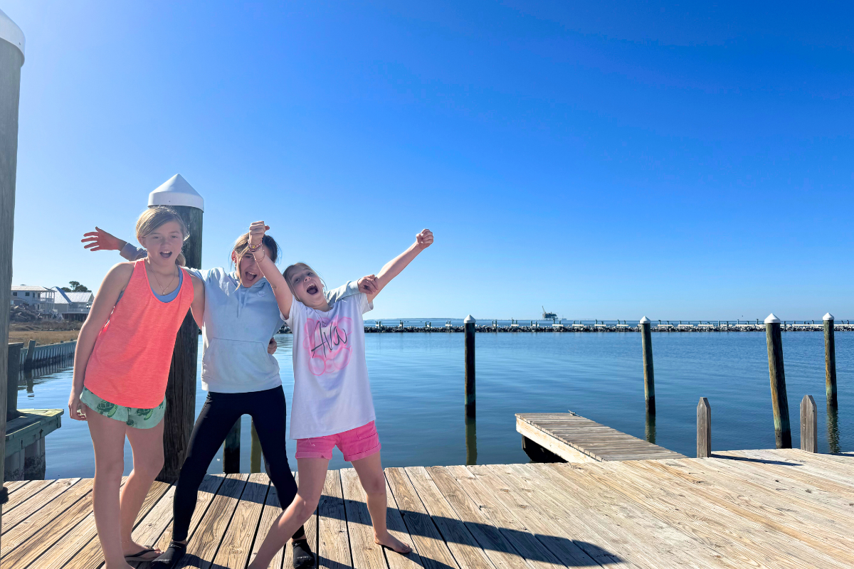girls having fun at fort morgan marina