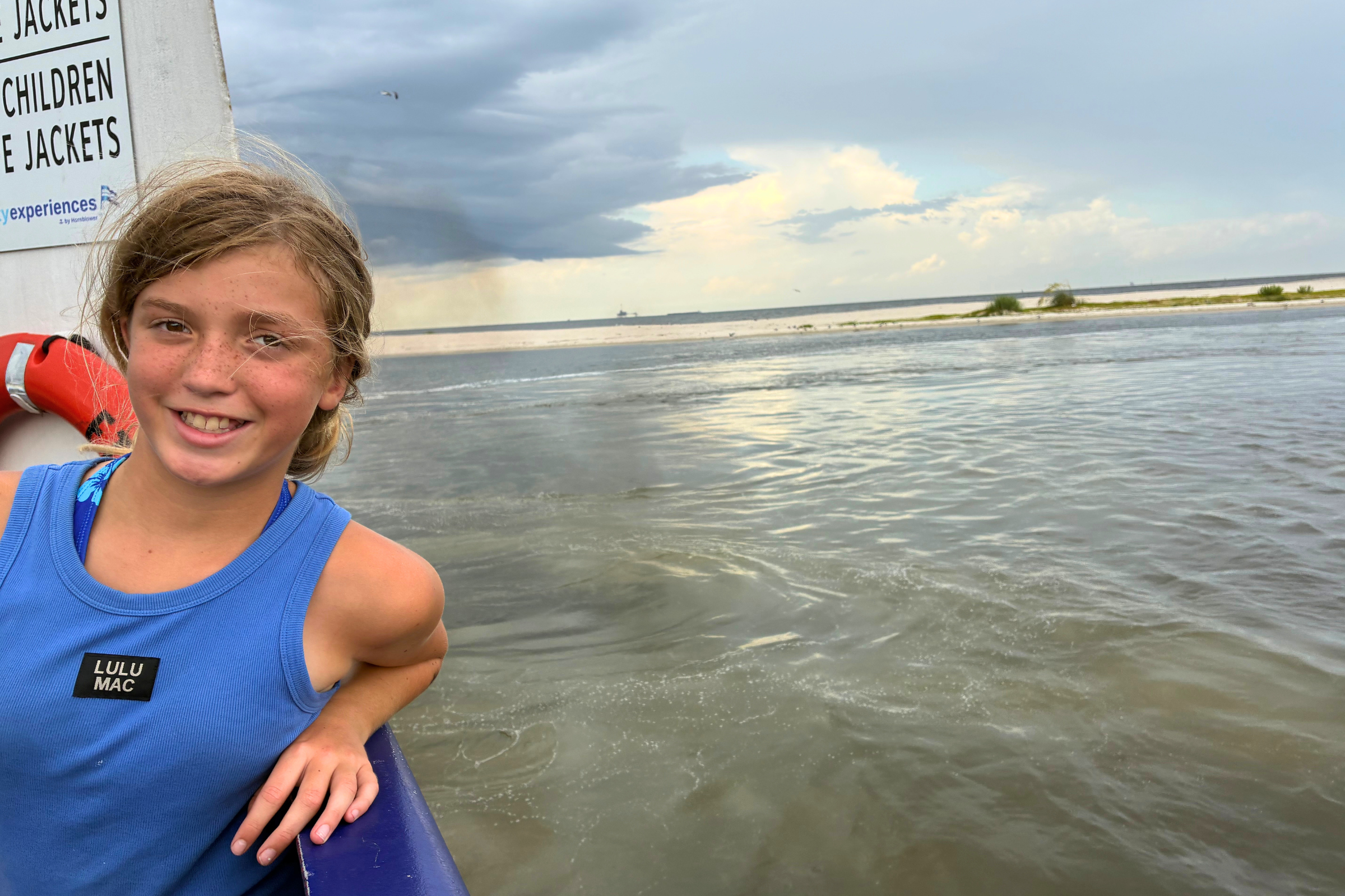 girl aboard the Mobile Ferry traveling from Fort Morgan to Dauphin Island